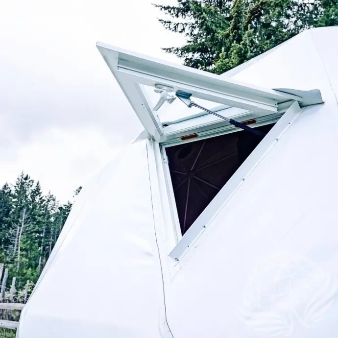 Opening Triangle Glass Window installed on a white geodesic dome
