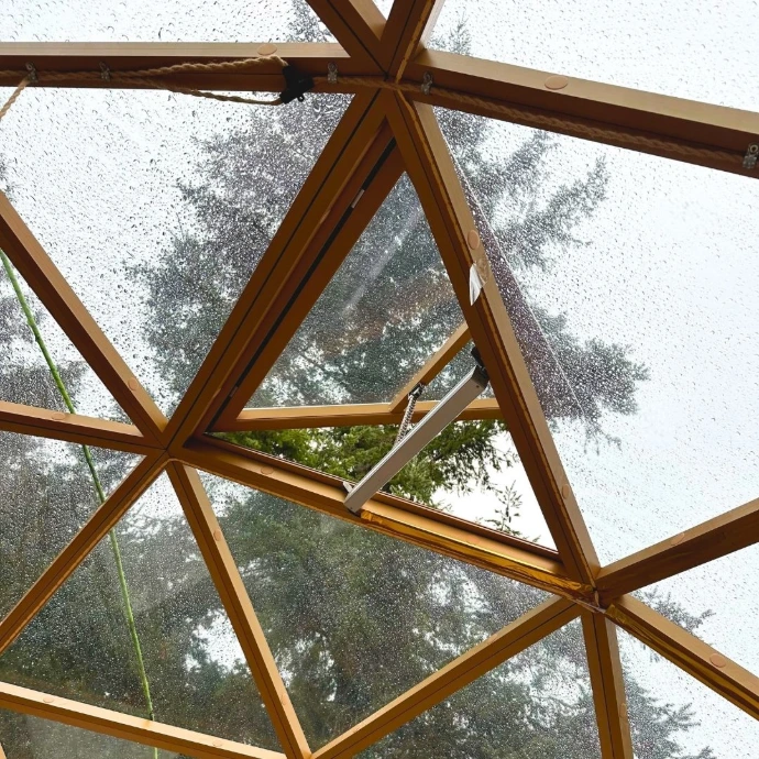 Glass dome with electric triangle window opening