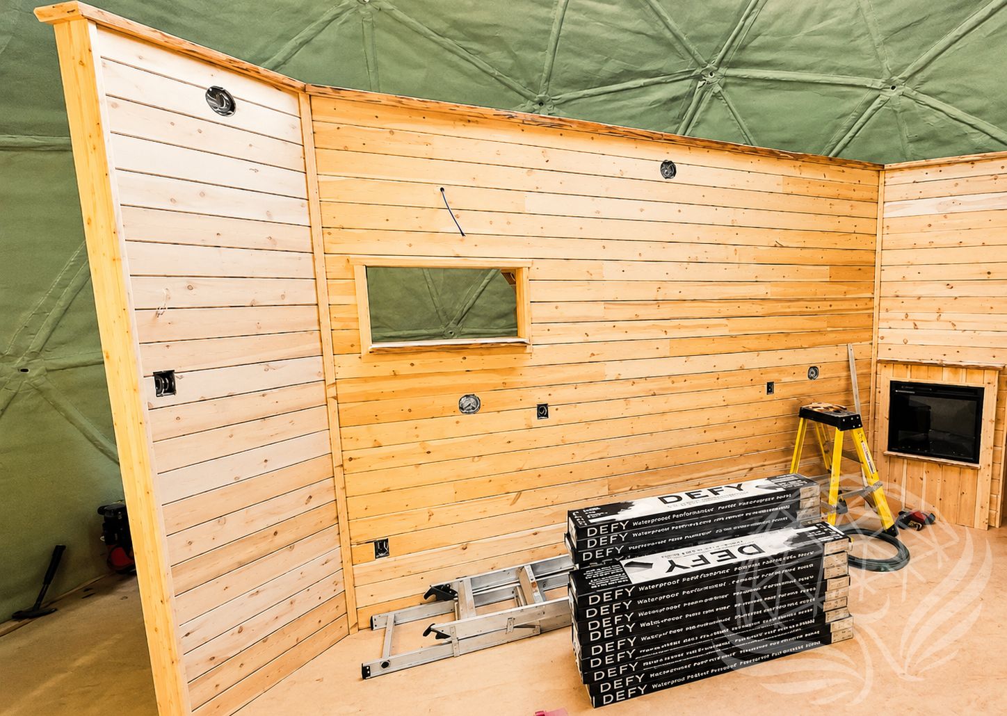Geodesic Ceiling and Wooden Renovation Wall