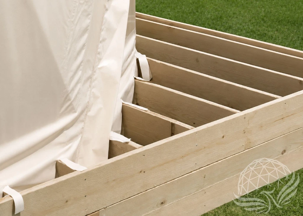 Canvas Tent Frame on Green Lawn