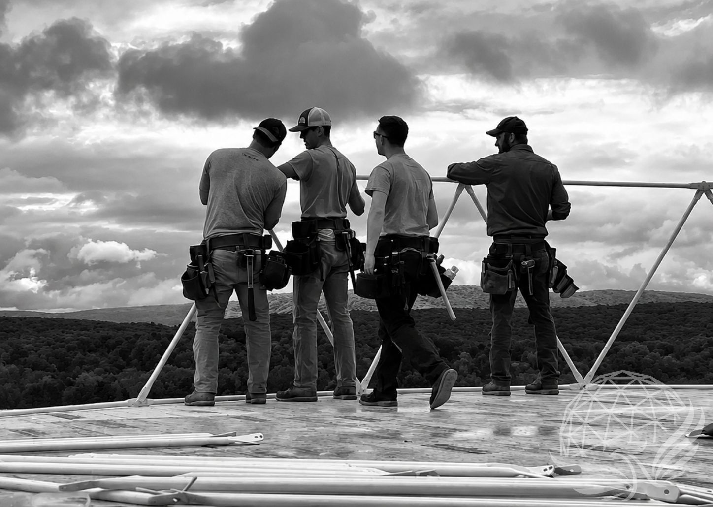 Construction Crew Under Dramatic Skies