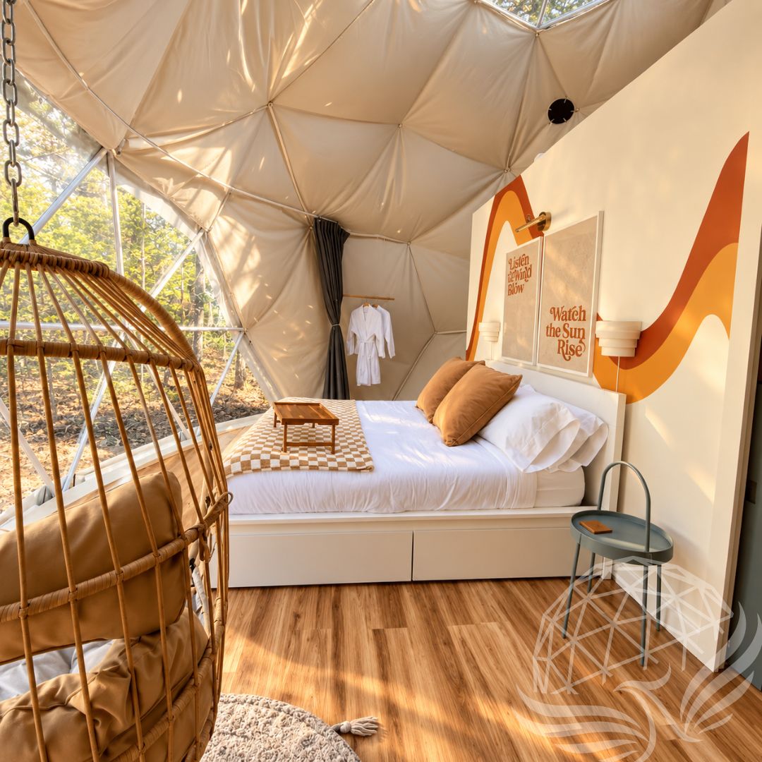 Bright dome bedroom with panoramic window at Moonshine Dome Retreat